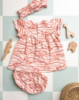 Dos de l’ensemble robe imprimée Bandia de Bobo Bassari, illustrant les finitions élégantes et la coupe adaptée aux bébés